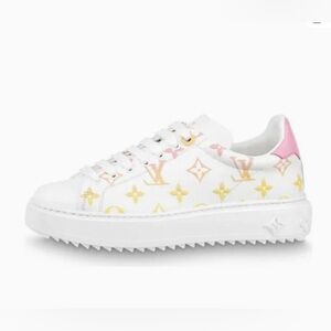 Louis Vuitton Pink and Yellow Time Out Leather Sneaker with Pink Heel Tab.